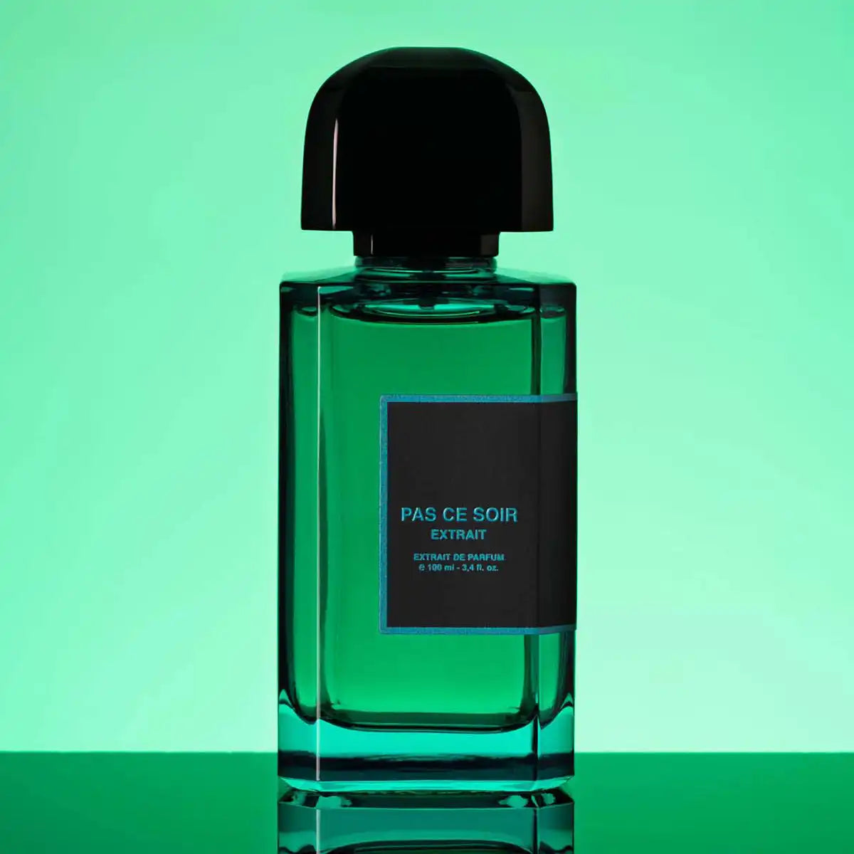Pas Ce Soir Extrait Eau de Parfum by BDK Parfums, 100ml bottle displayed against a vibrant green background