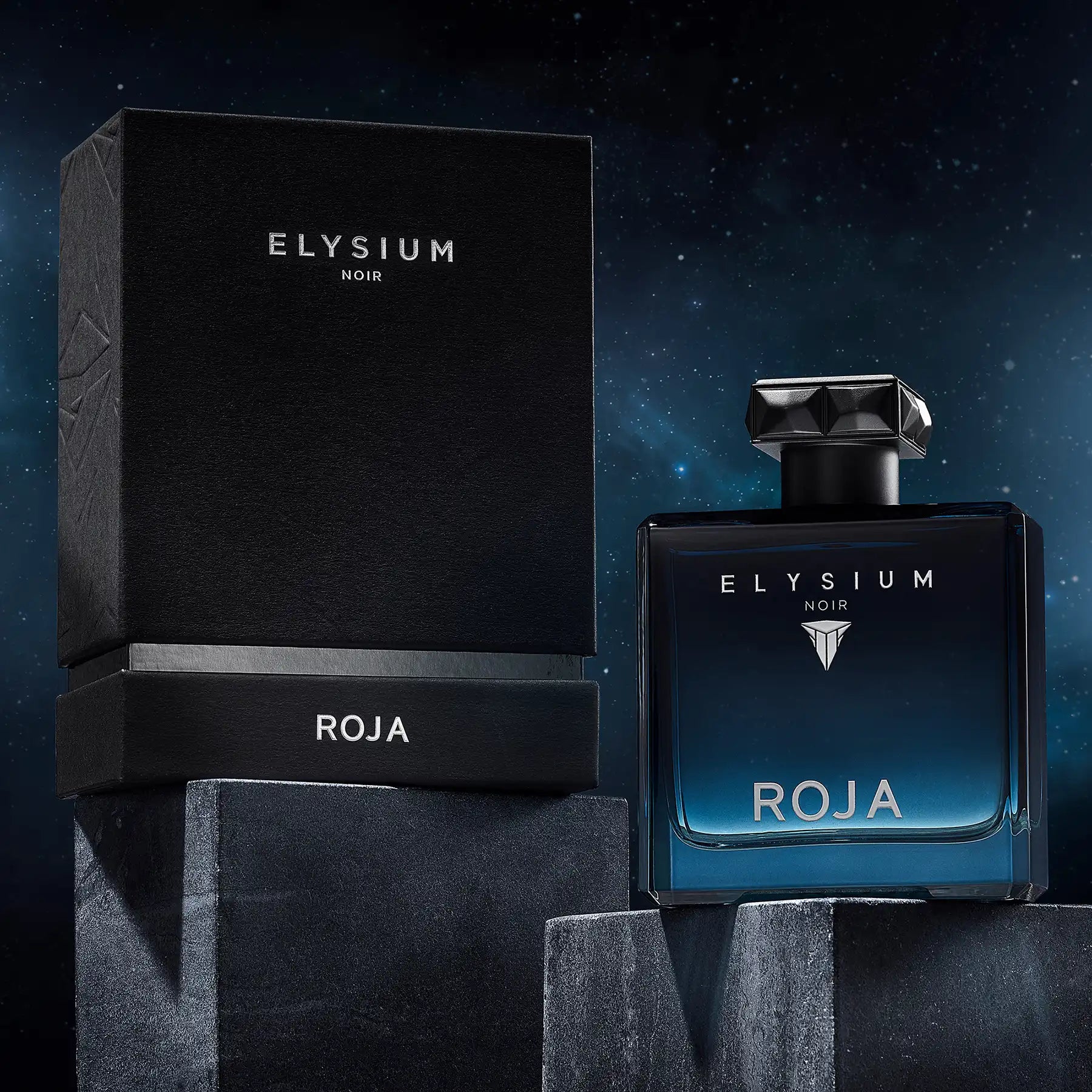 Roja Elysium Noir perfume bottle and luxury black packaging displayed on stone blocks