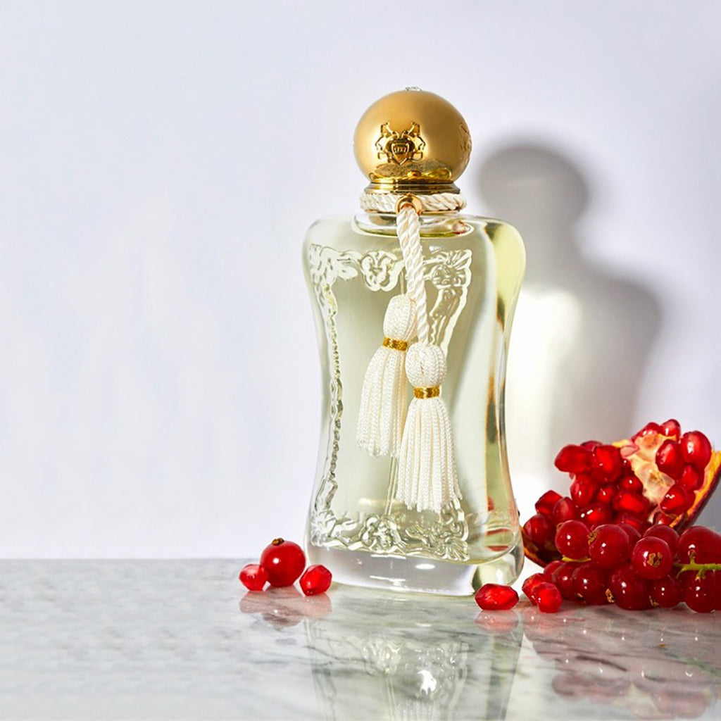 Meliora by Parfums de Marly, 75ml bottle displayed elegantly with red flower petals