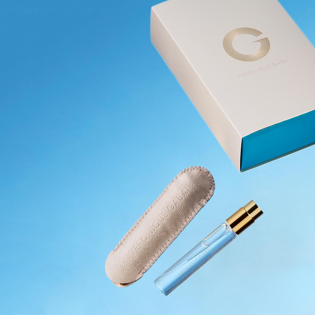 Booster Eau De La Jour Travel Spray Case Refill by Veronique Gabai, 10ml blue bottle with white and blue travel case