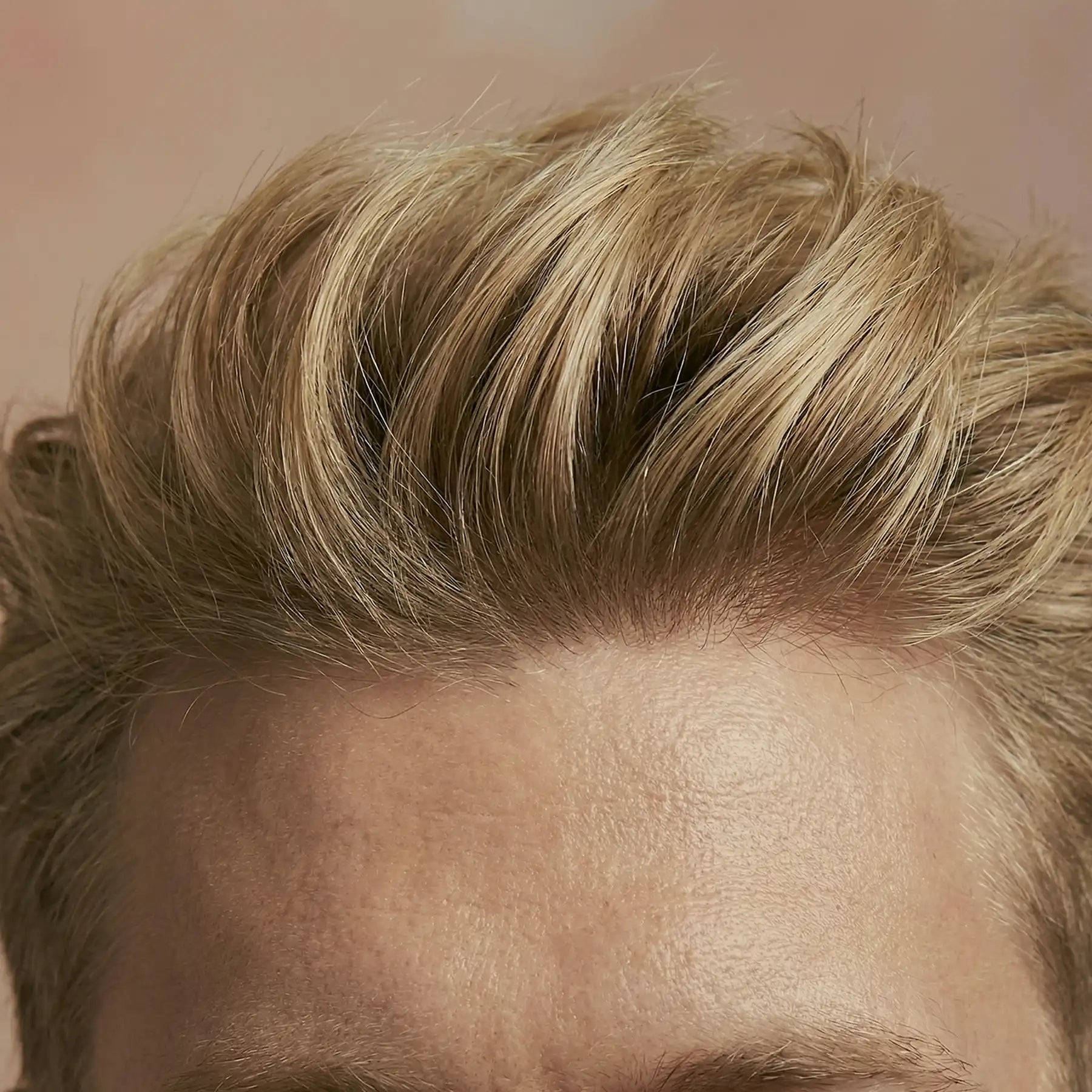 Blonde hair styled with Morris Motley Matte Styling Balm showing volume and textured finish