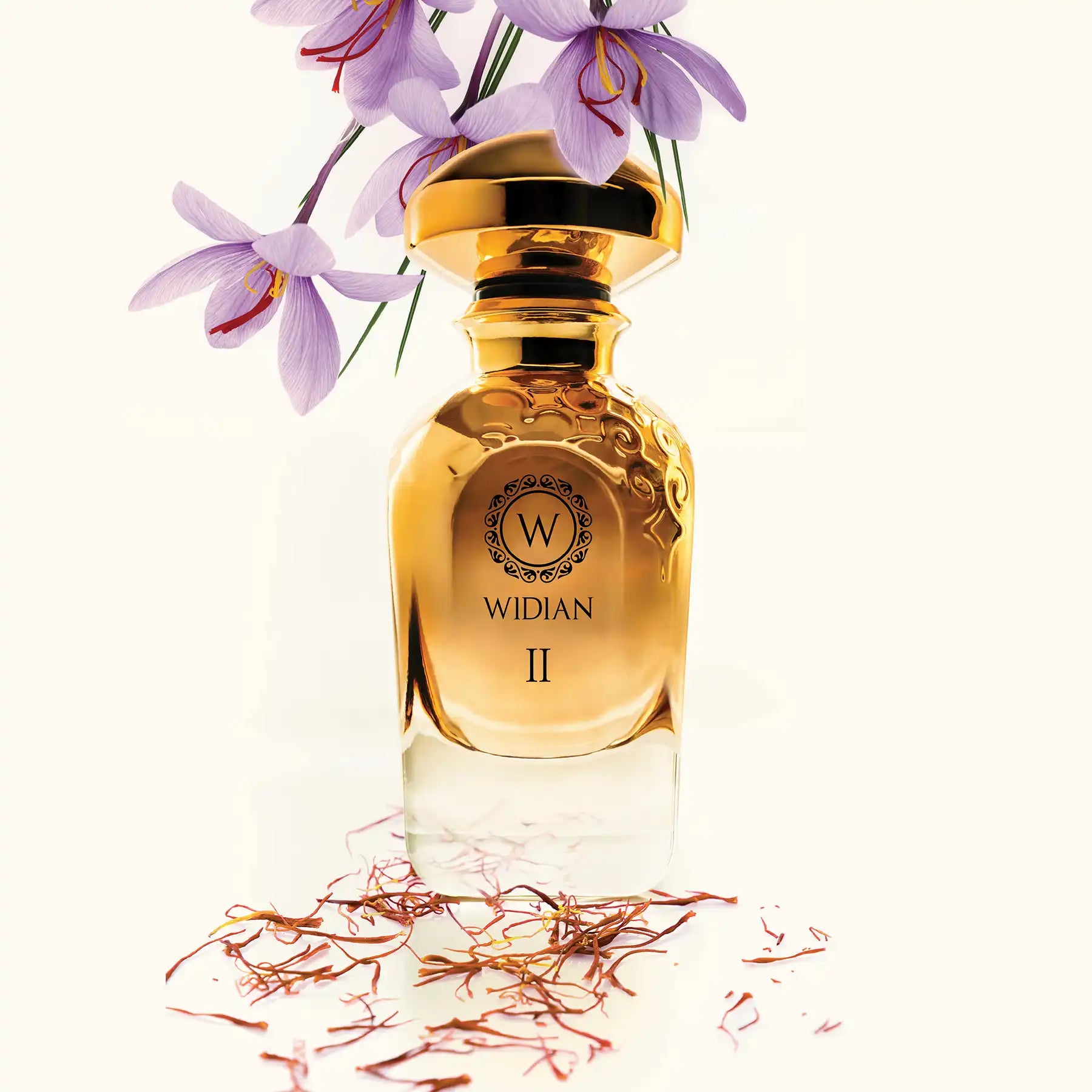 Gold II Sahara Eau de Parfum by Widian, 50ml golden bottle with purple flowers and dried petals in background